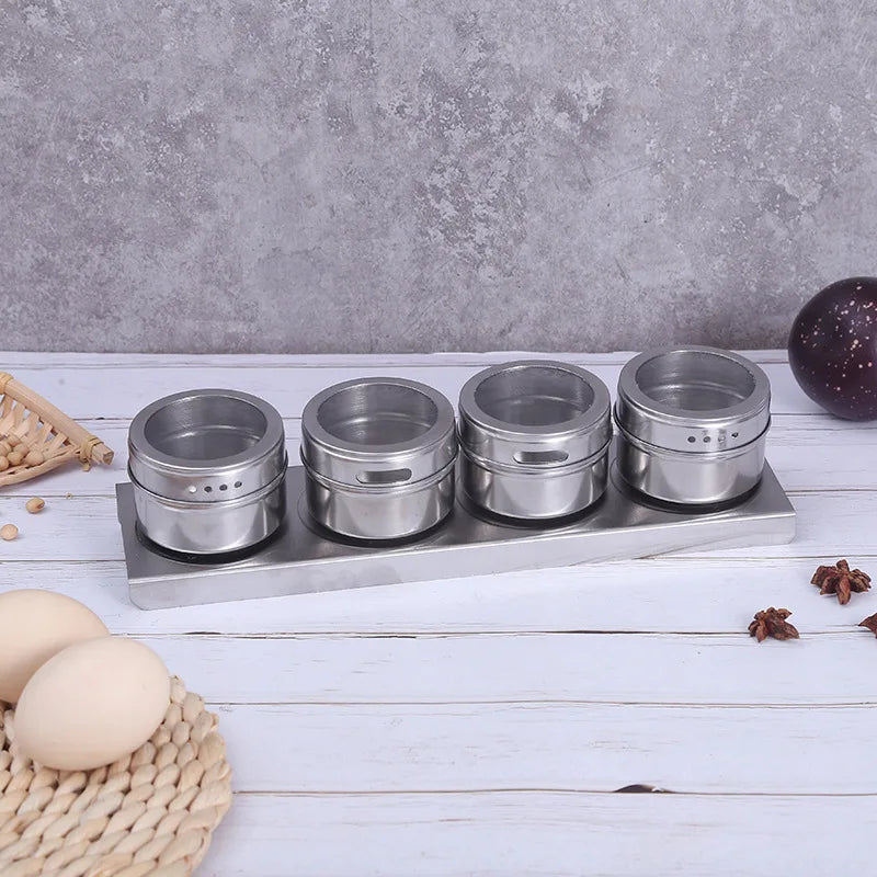 Magnetic stainless steel spice jars on fridge
