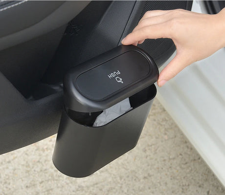 Portable mini trash can hanging in car