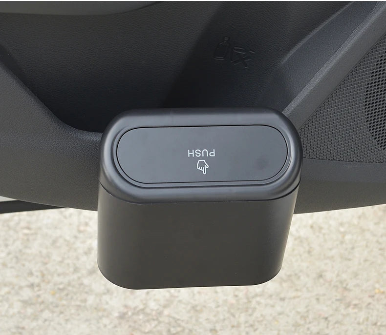 Portable mini trash can hanging in car