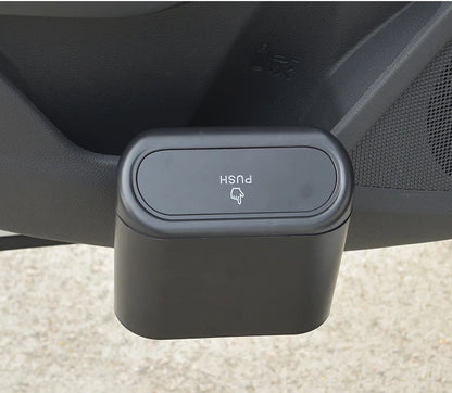 Portable mini trash can hanging in car
