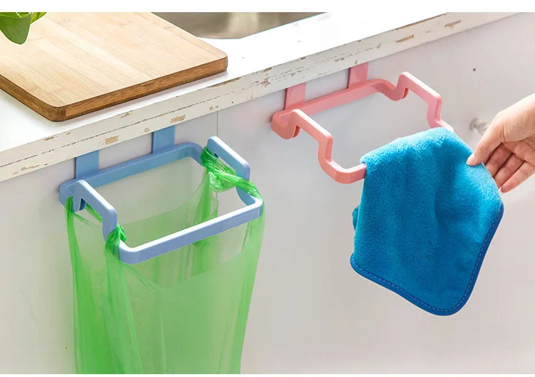 Hanging trash bag holder on kitchen cabinet