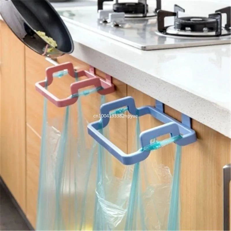 Hanging trash bag holder on kitchen cabinet