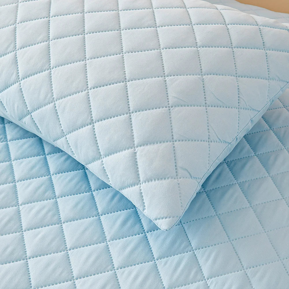 Waterproof Throw Pillowcases in soft breathable fabric with quilted design, perfect for protecting pillows.