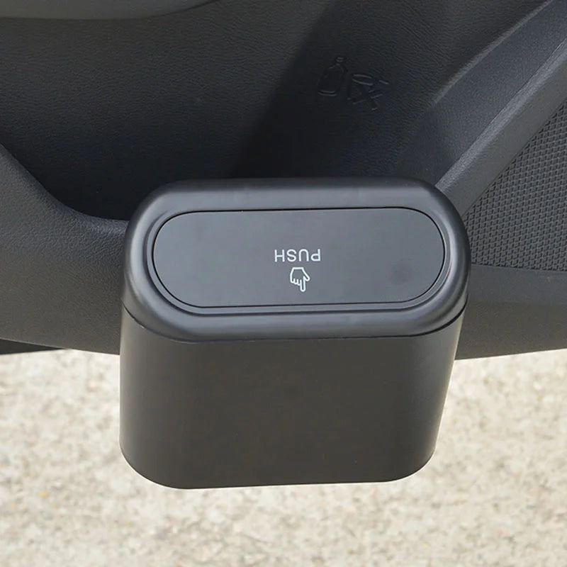 Car trash bin hanging behind seat