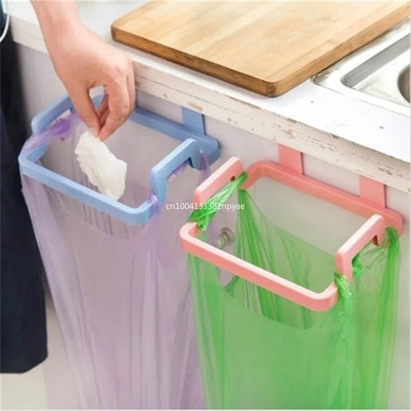 Hanging trash bag holder on kitchen cabinet