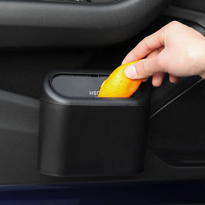 Car trash bin hanging behind seat