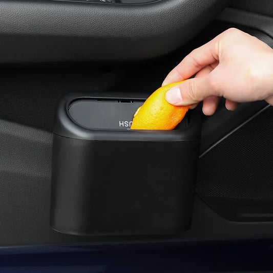 Car trash bin hanging behind seat