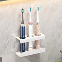 Wall-mounted toothbrush holder for electric toothbrushes