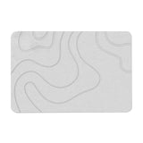 Diatomite bath mat in modern bathroom