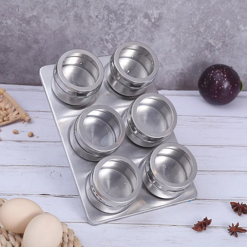 Magnetic stainless steel spice jars on fridge