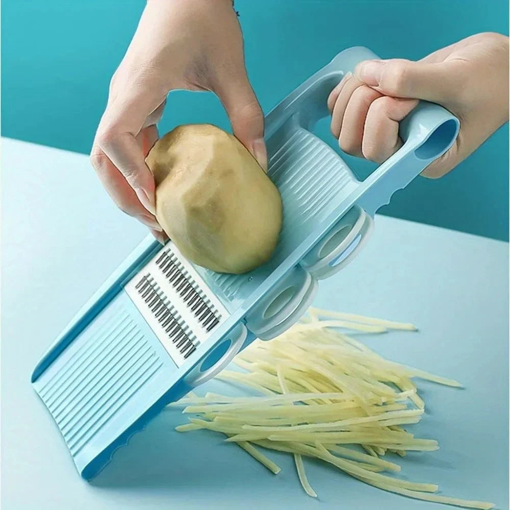 Vegetable chopper slicing vegetables in kitchen