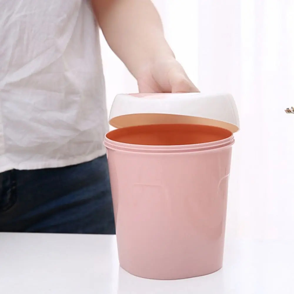 Mini trash can with swing-top lid