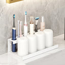 Wall-mounted toothbrush holder for electric toothbrushes